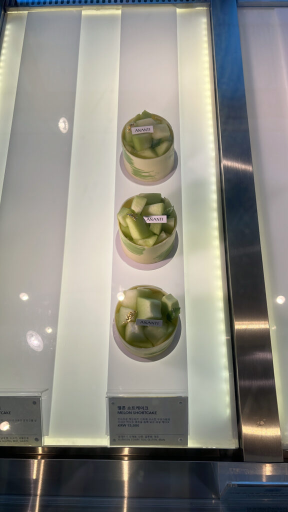 Delicate mini melon cake dessert on display at McQueen's Lounge Busan