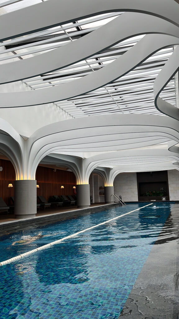 Architecturally designed ceiling and lanes of the 10th-floor indoor pool