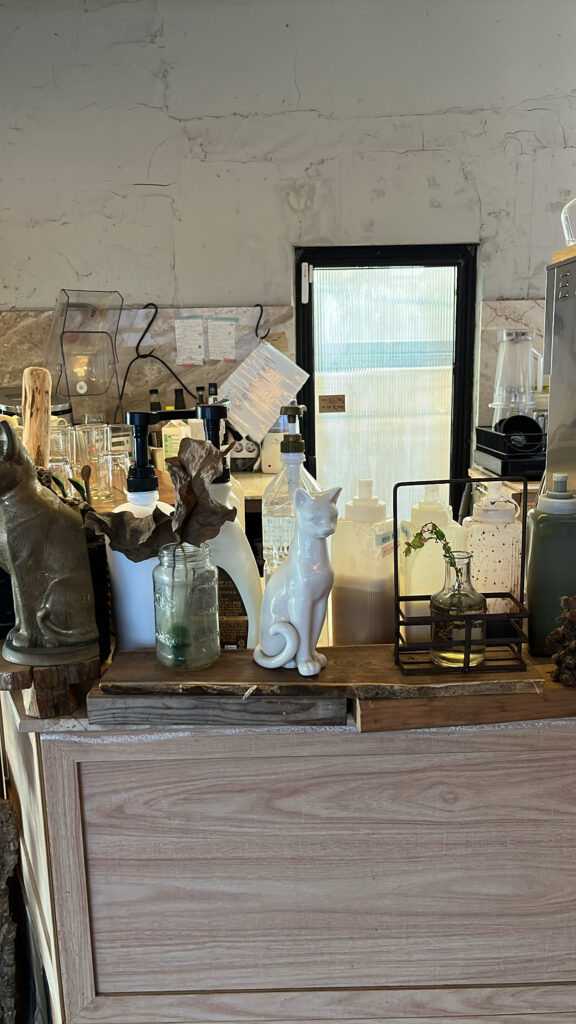 View of the beverage preparation and service area on the 1st floor with vintage decor at Green Nomad Busan