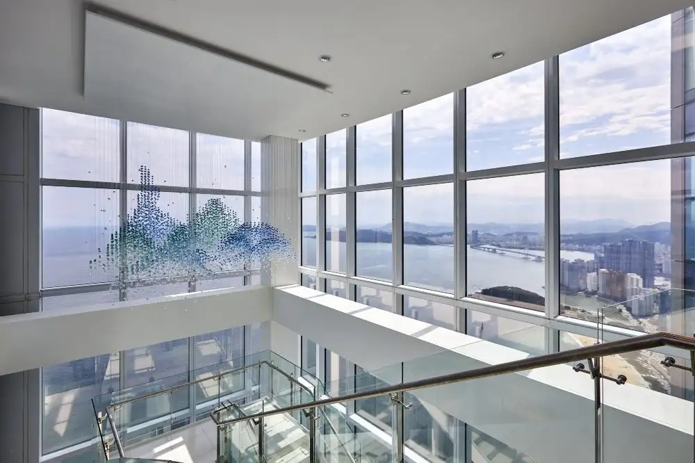 Modern interior view of Busan X the Sky observatory looking out over Haeundae ocean