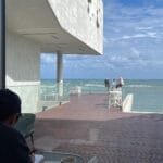 Scenic outdoor terrace seating at Coralani Busan overlooking the open East Sea
