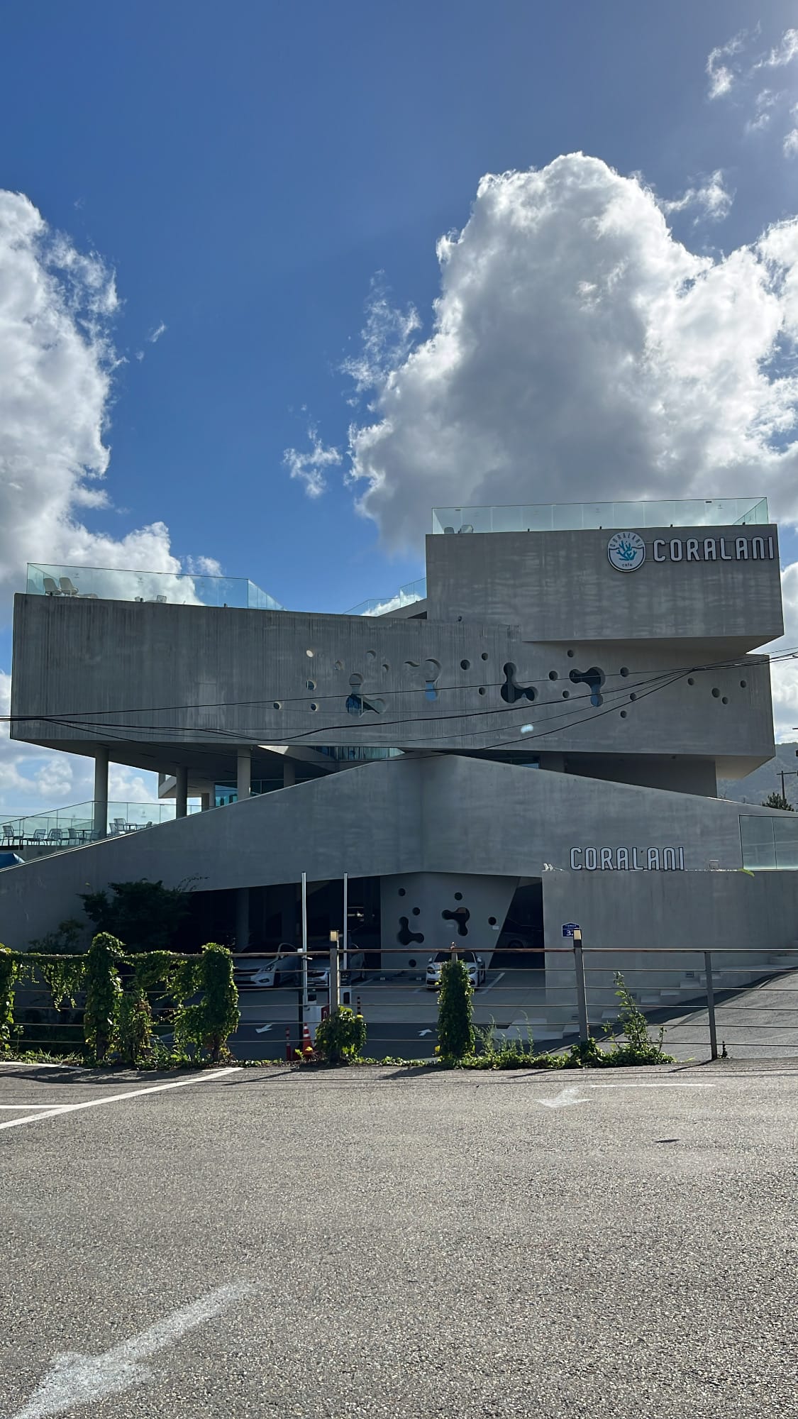 Massive concrete building exterior of Coralani Busan mega cafe near Songjeong