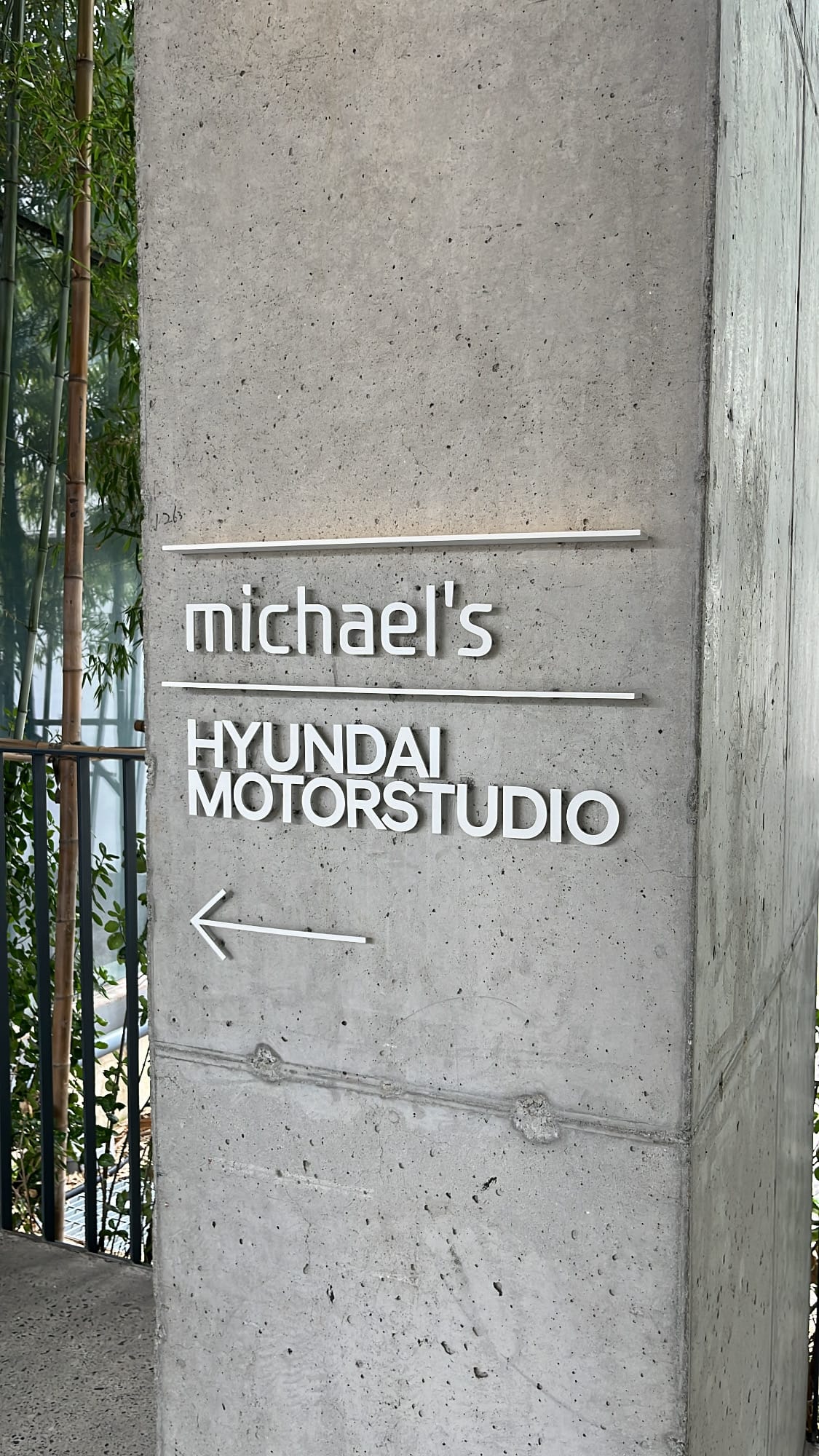 Minimalist exterior concrete wall signage for Michael's Hyundai Motorstudio Busan