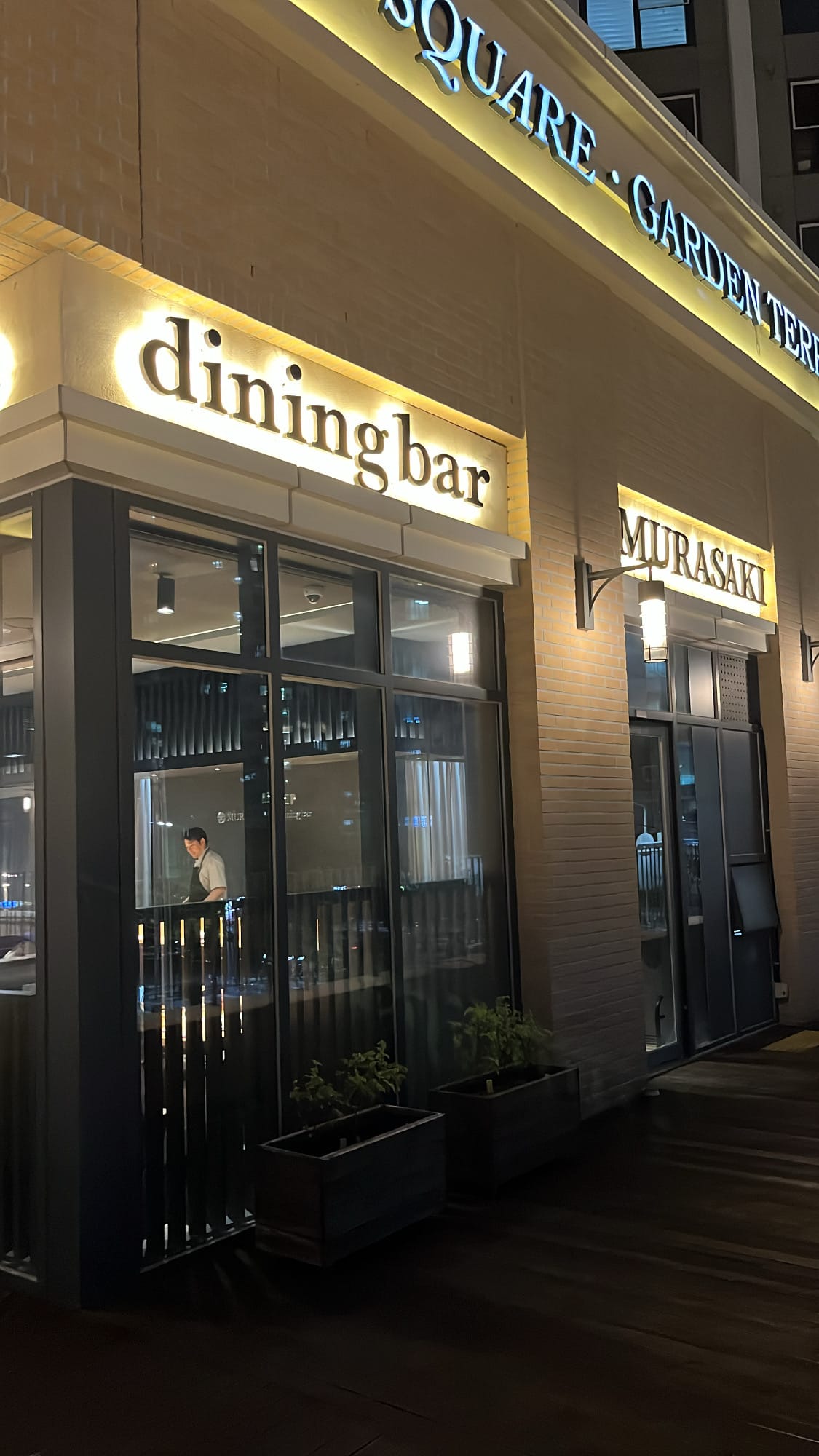 Second floor glass storefront and dining bar entrance of Murasaki Busan