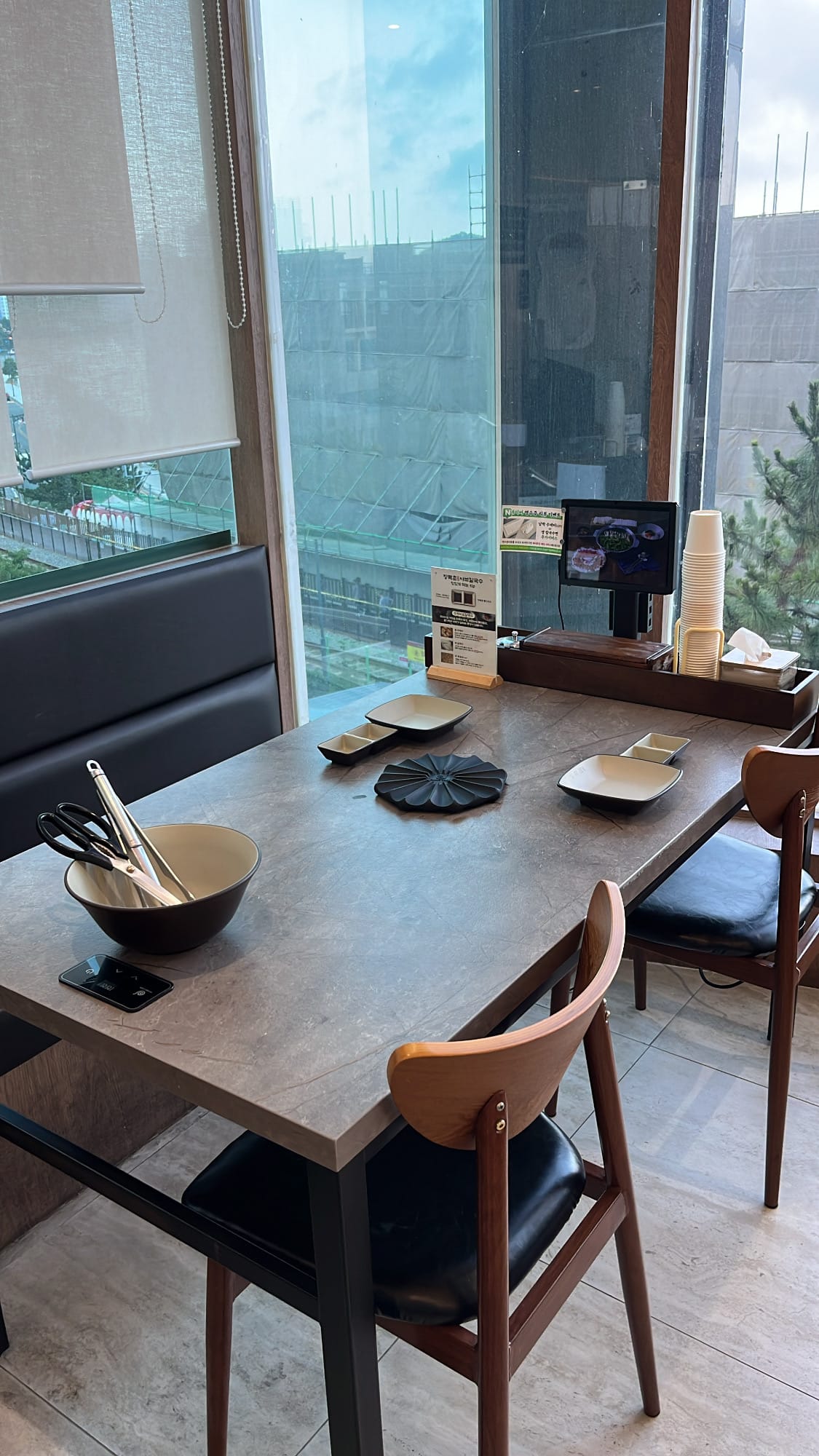 Window table seating with tablet ordering system and ocean view