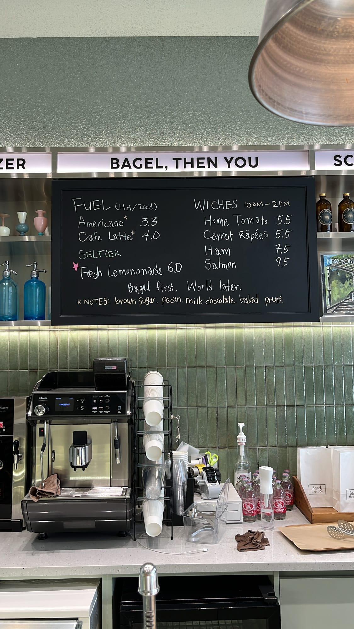 Blackboard menu displaying coffee, drinks, and lunch bagel sandwiches at Bagel Then You Busan Centum