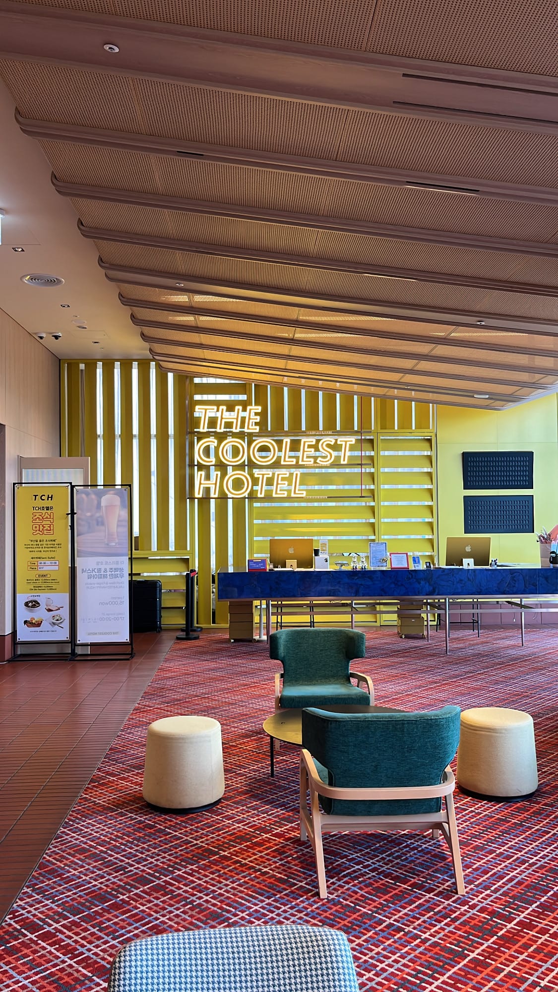 Trendy lounge seating area in the lobby of The Coolest Hotel Busan