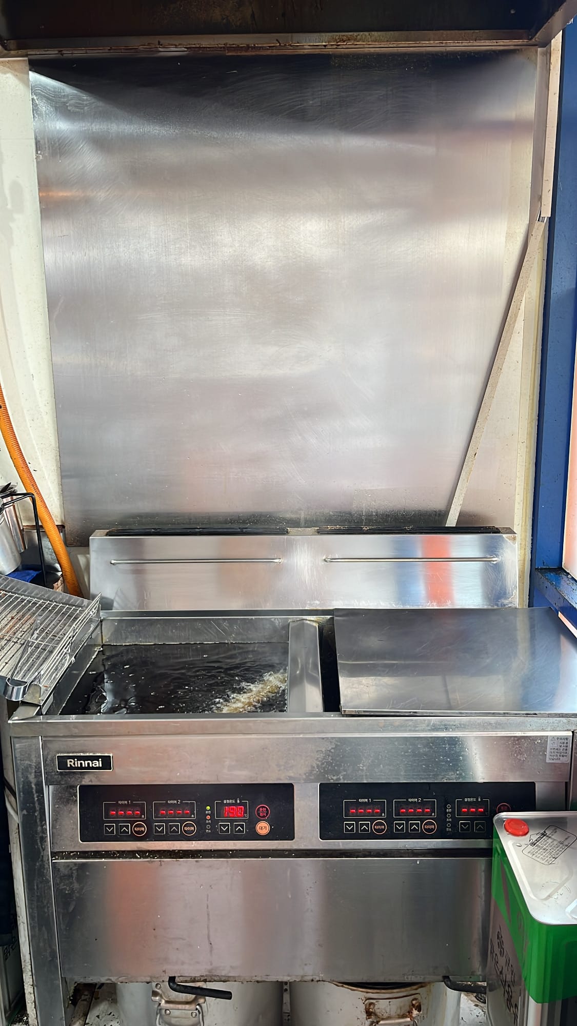 Stainless steel commercial deep fryer station at Chuplus Songjeong Busan