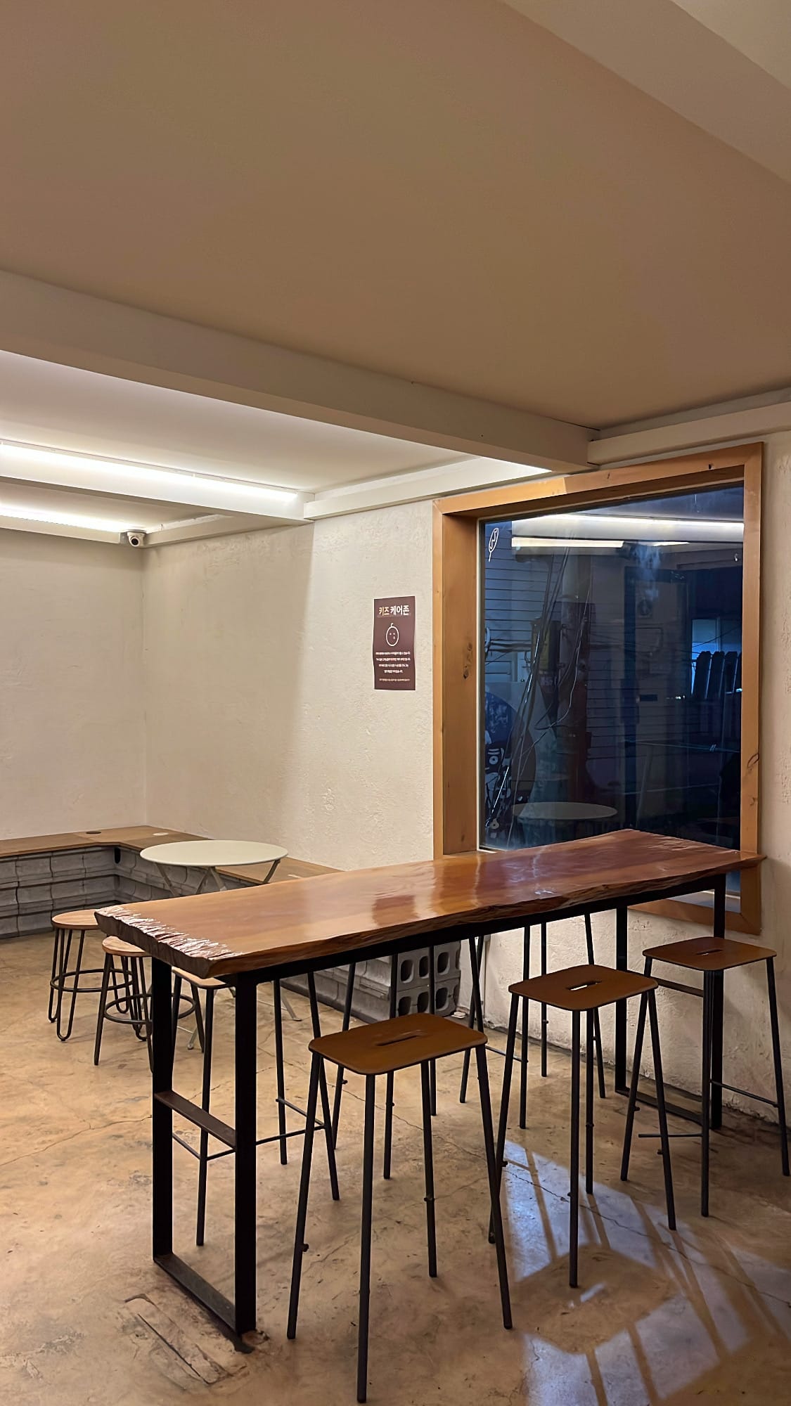 Indoor seating area on the second floor of Songjeong Hot Dog Busan