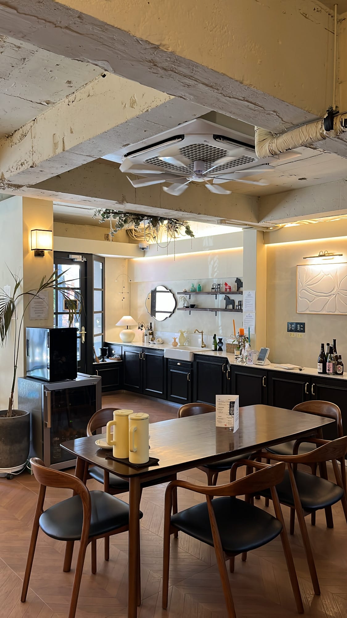 Danicci spacious Nordic dining interior with warm wooden tables