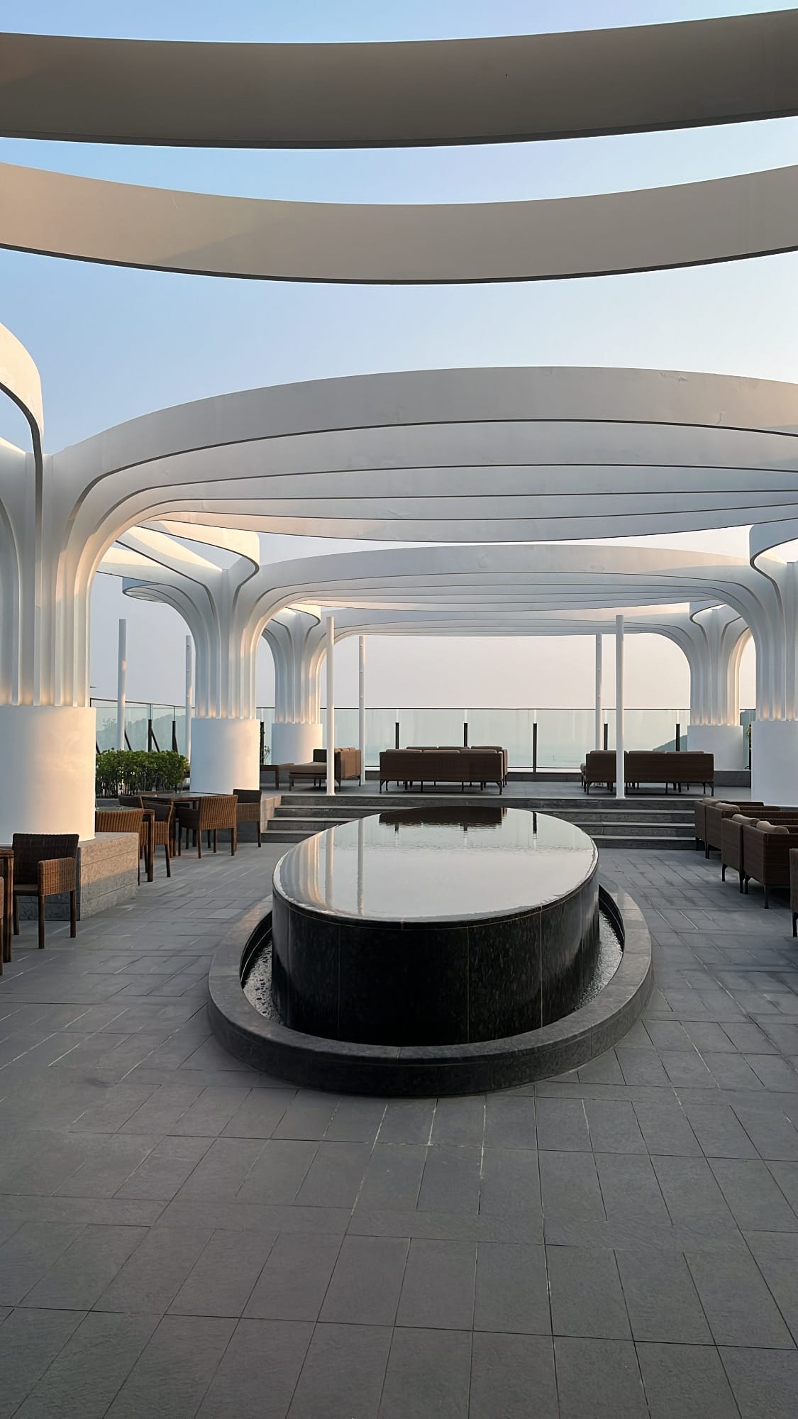 Scenic coastal terrace setup outside McQueen's Grill and Bar at Ananti Busan