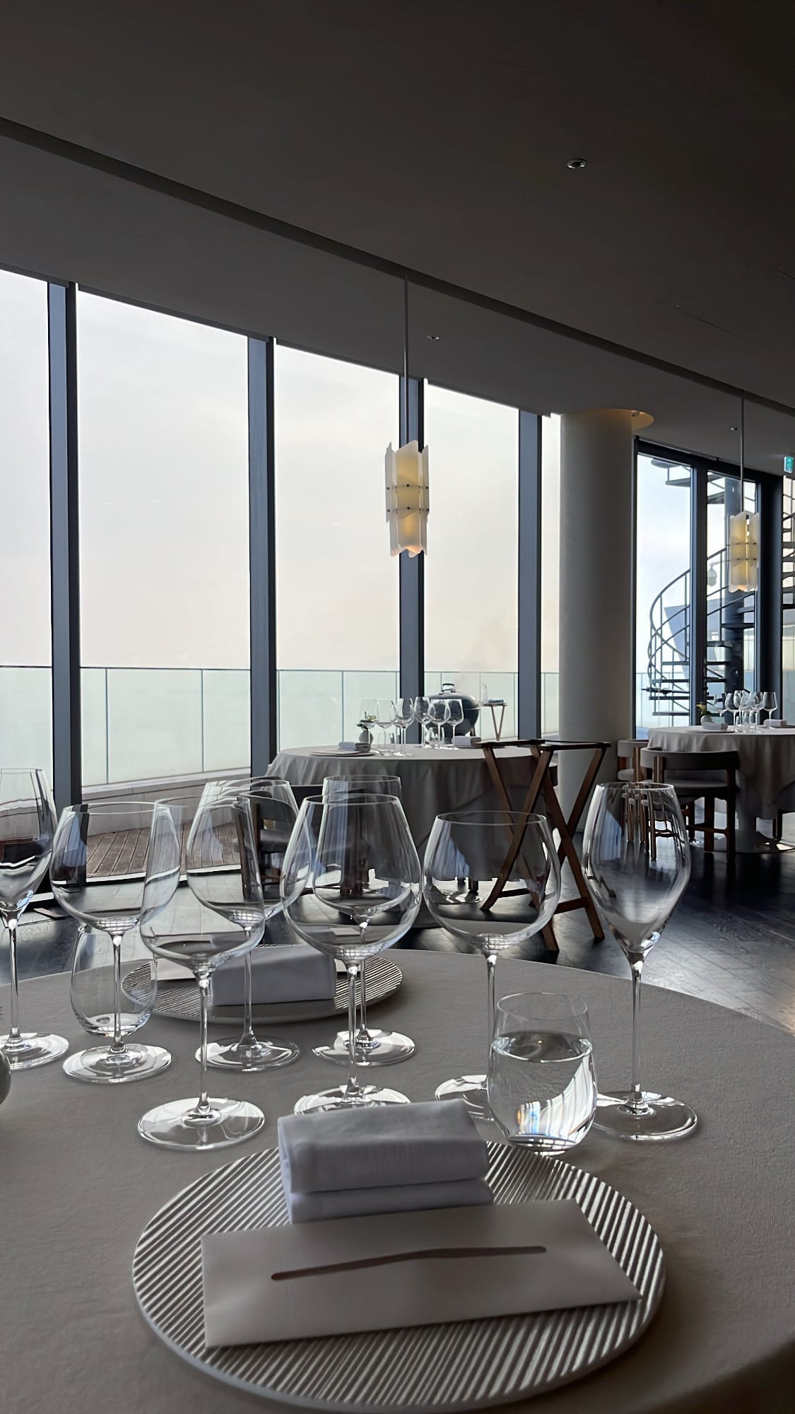 Elegant contemporary French dining table setting at Palate Busan