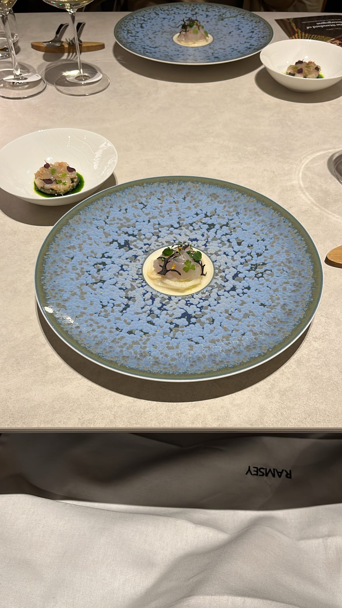 Seasonal fish crudo entrée at Ramsey Busan