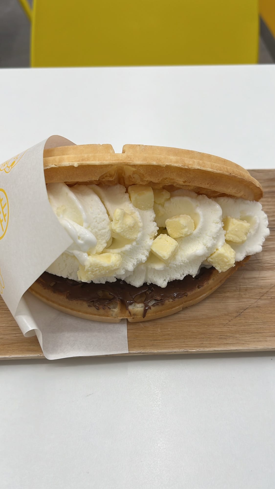 Waffle University Centum Busan close-up of crispy waffle loaded with cheesecake cubes