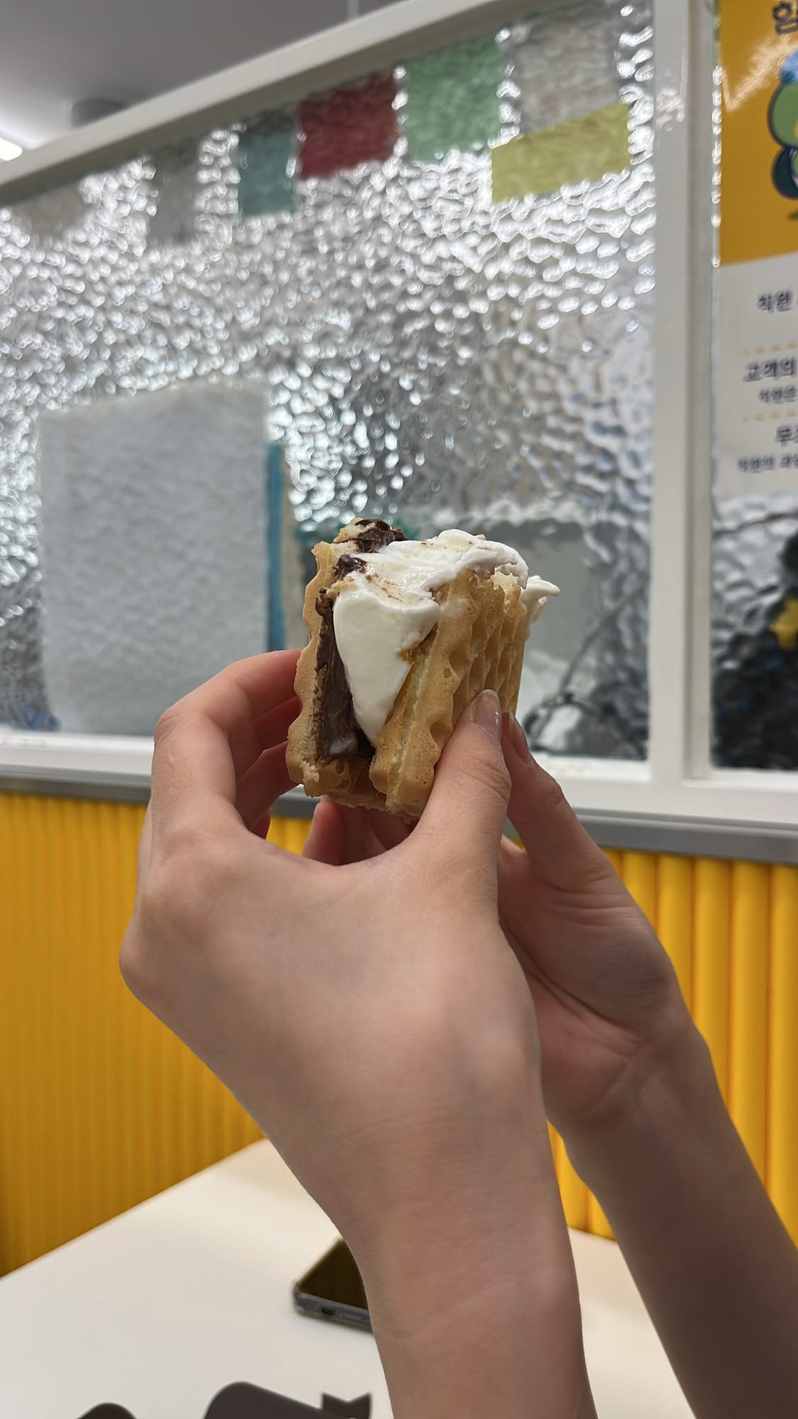 Waffle University Centum Busan handheld waffle cross section filled with nutella and gelato