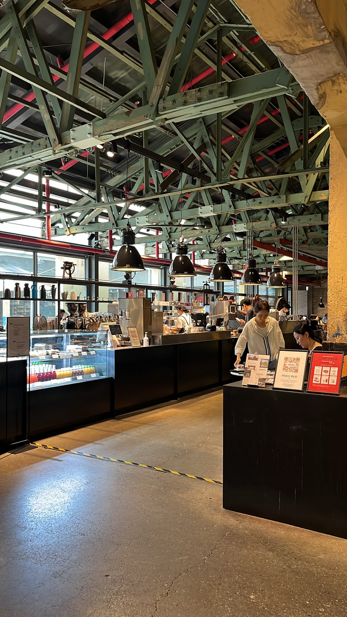 Order counter for cakes and bottled beverages at Terarosa Coffee