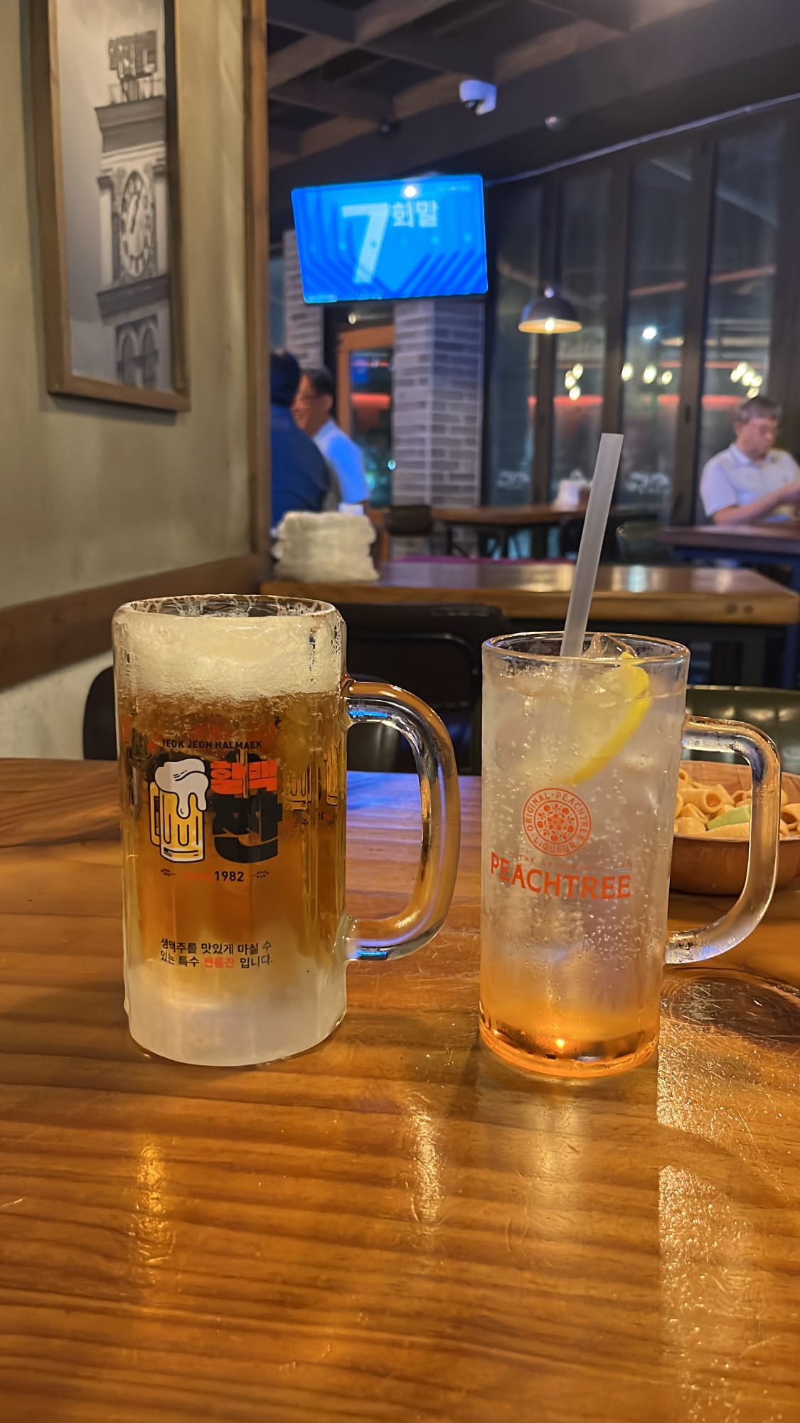 Frosted mug draft beer and peach highball at Yeokjeon Grandma Beer Centum City