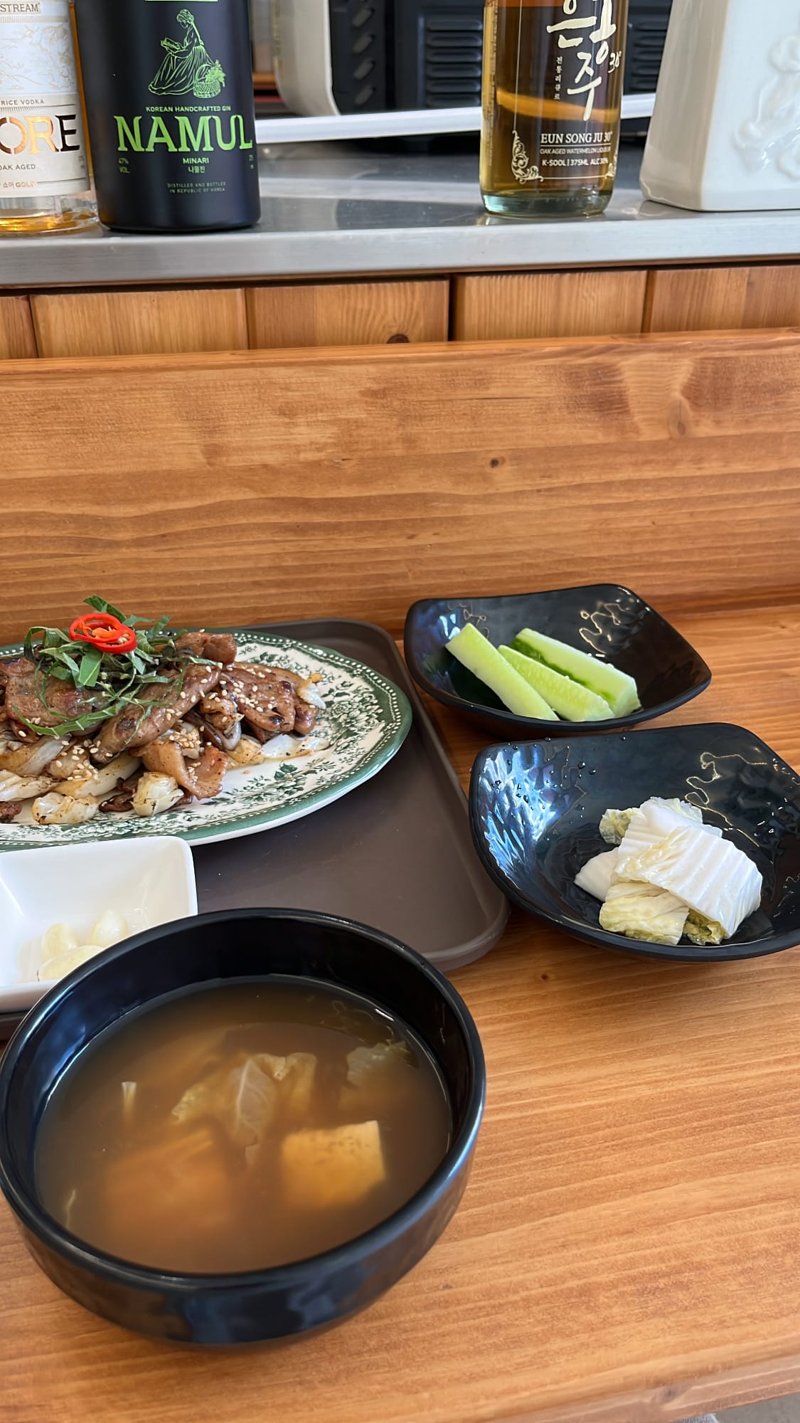 Warm bowl of Korean soup served with pork bulbaek lunch at Chef202 Busan