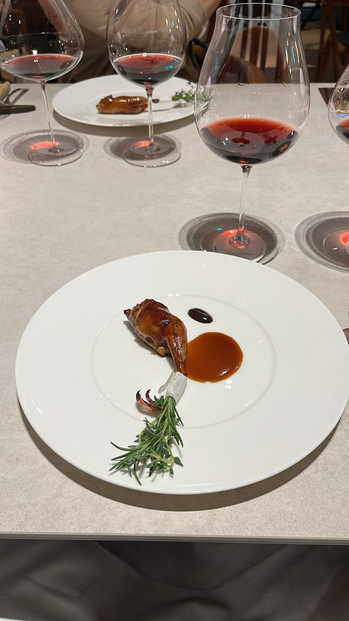 Crispy quail confit main course at Ramsey Busan