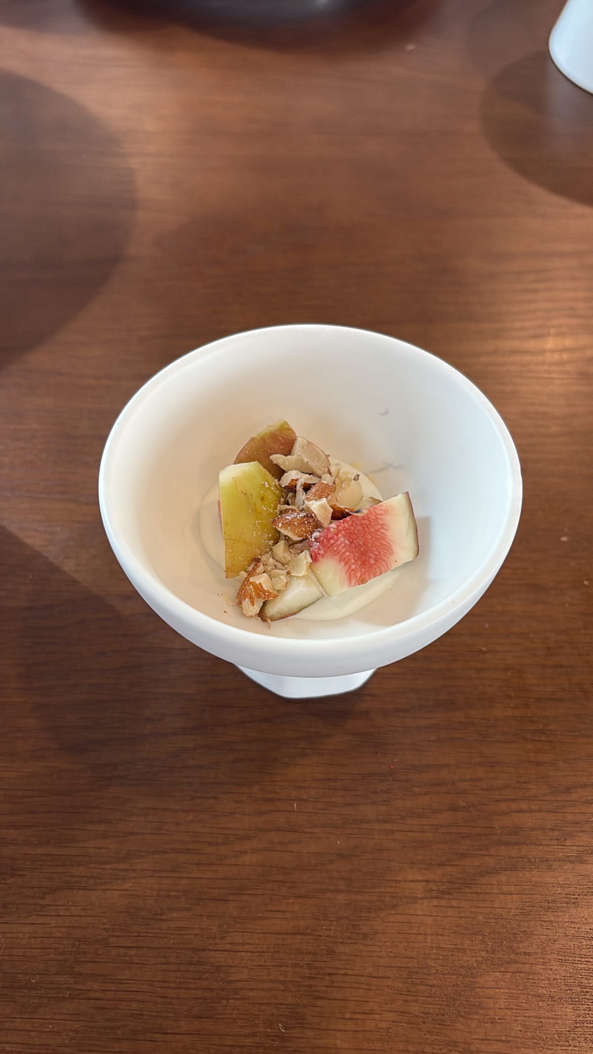 Complimentary seasonal dessert with fresh fig slices served at Yangkyungoak Busan