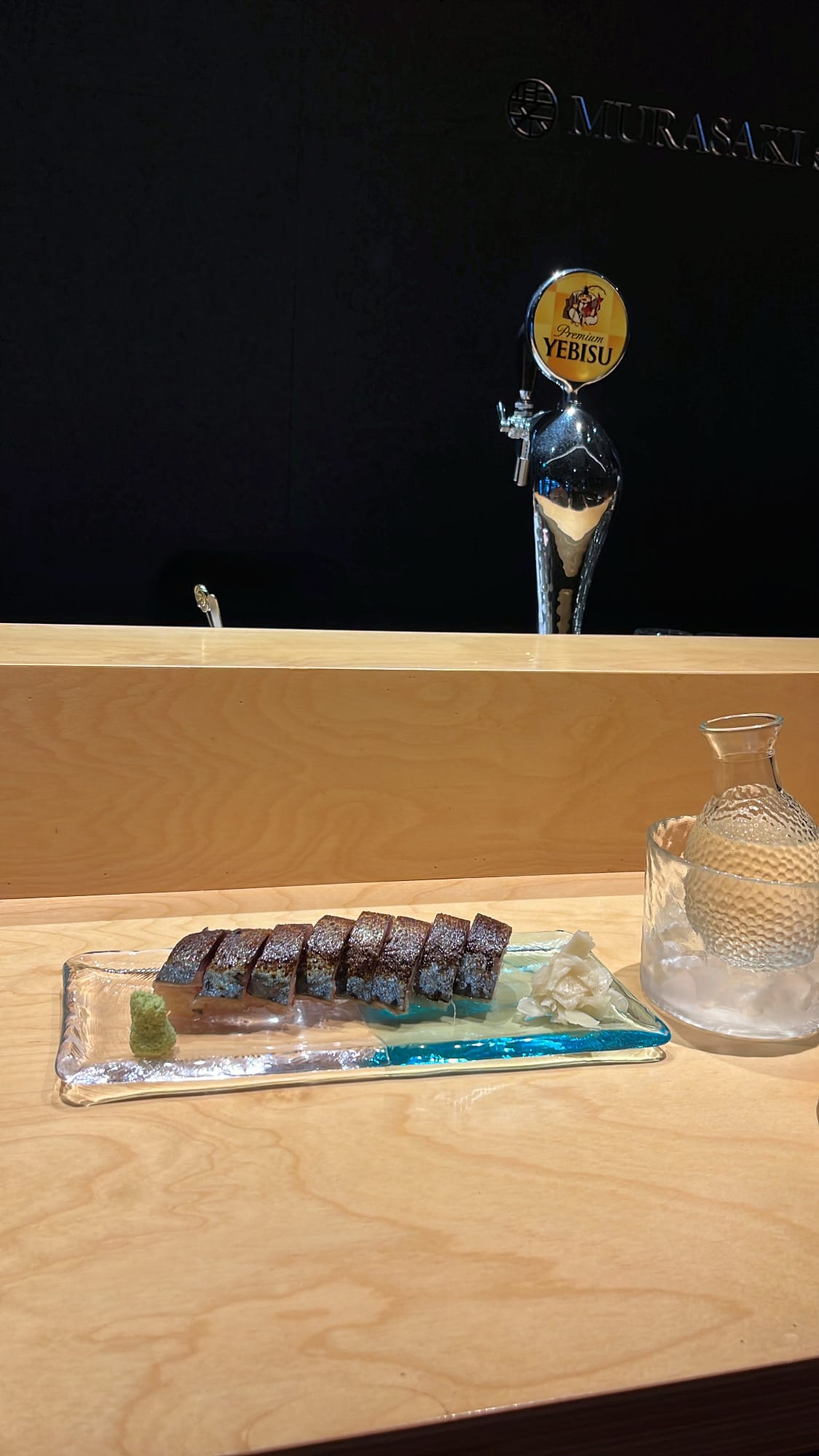 Eight pieces of seared Saba Bousushi mackerel pressed sushi at Murasaki Busan