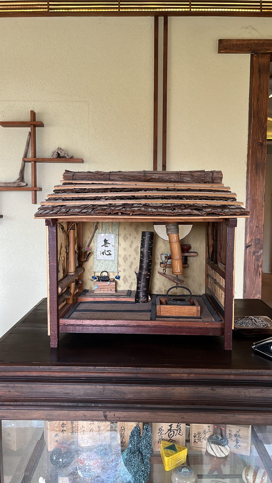 Intricate miniature model of a Japanese traditional tea house at Simmian Busan