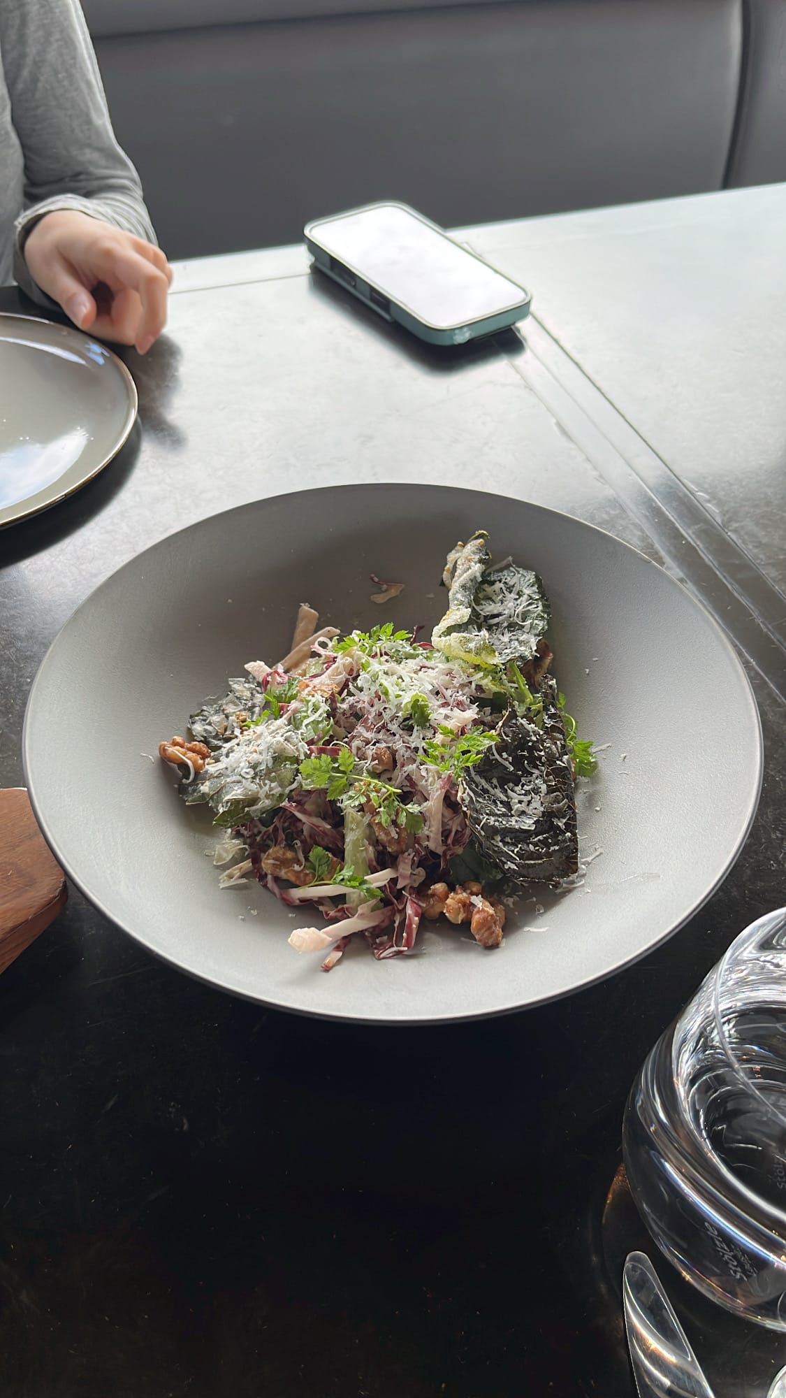Fresh farm salad topped with crispy fried perilla leaves and walnuts
