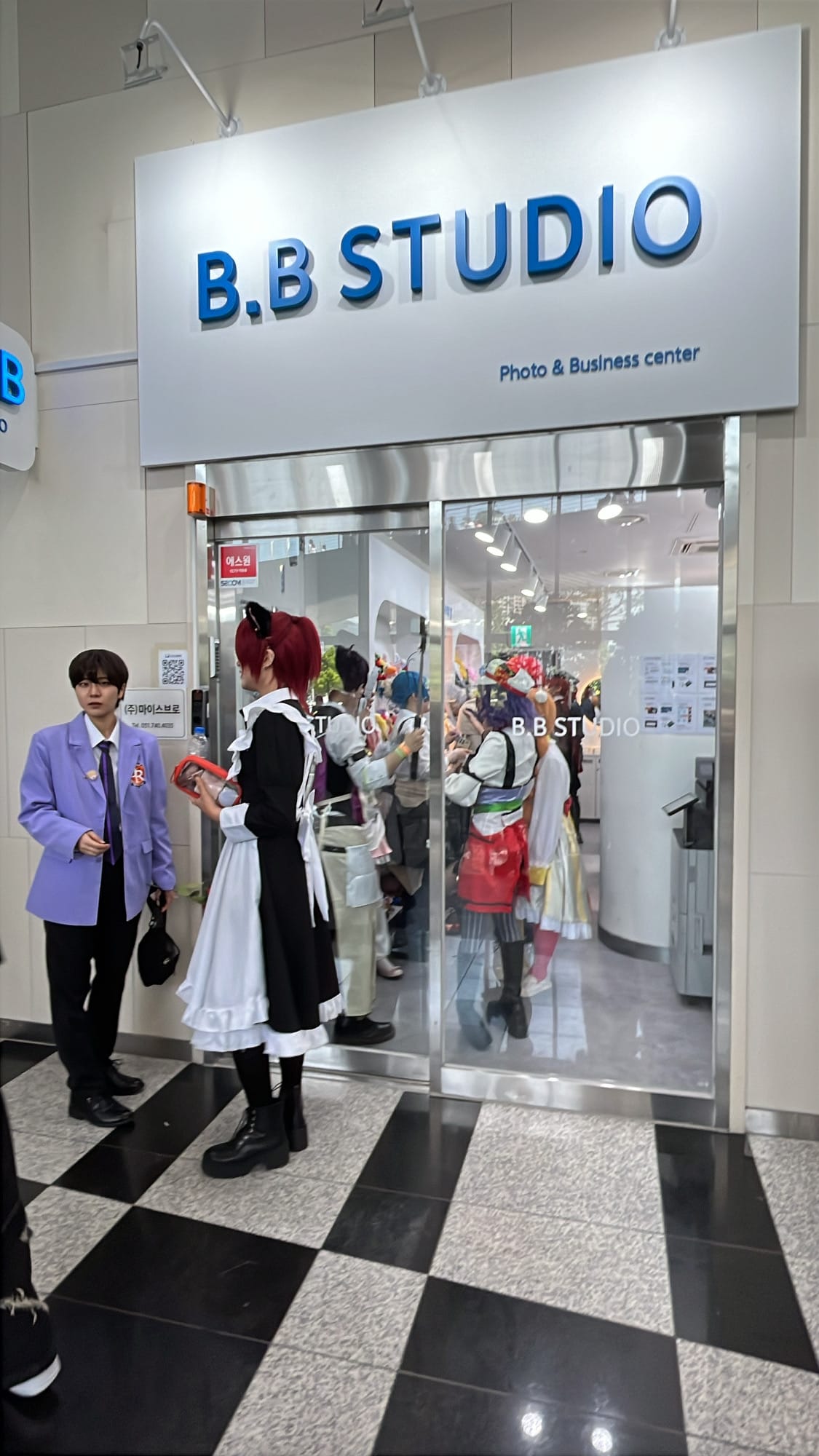 Cosplayers gathering at the BB Studio photo booth inside BEXCO