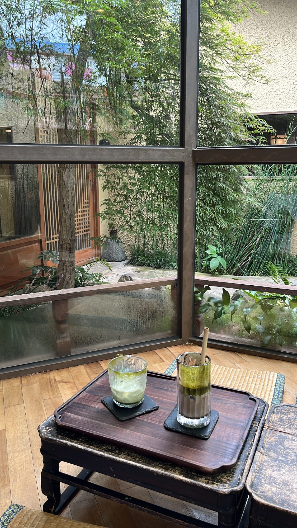 Signature tatami window table overlooking the inner garden at Simmian Busan