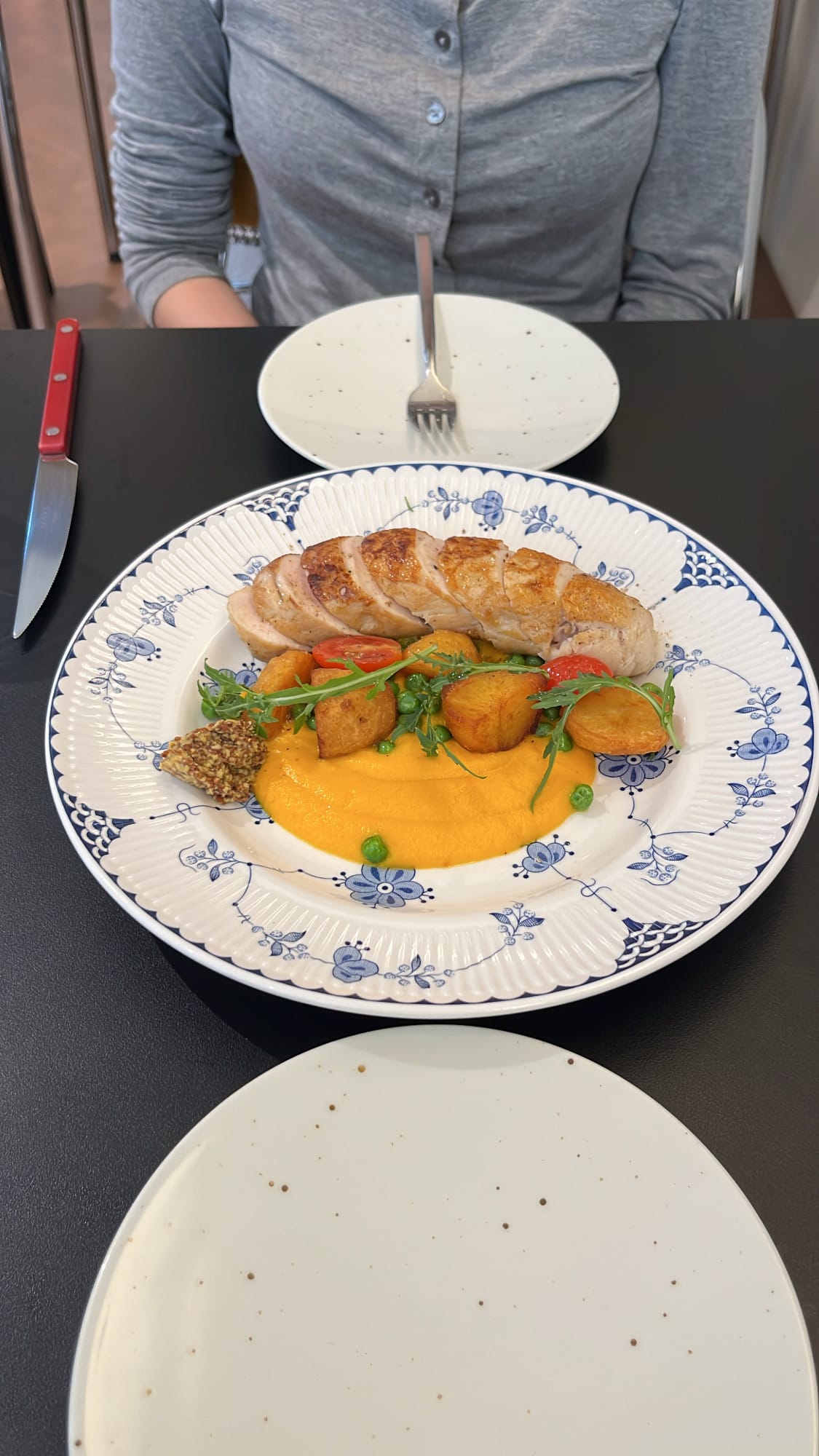 Danicci pan-seared chicken breast steak over smooth carrot puree