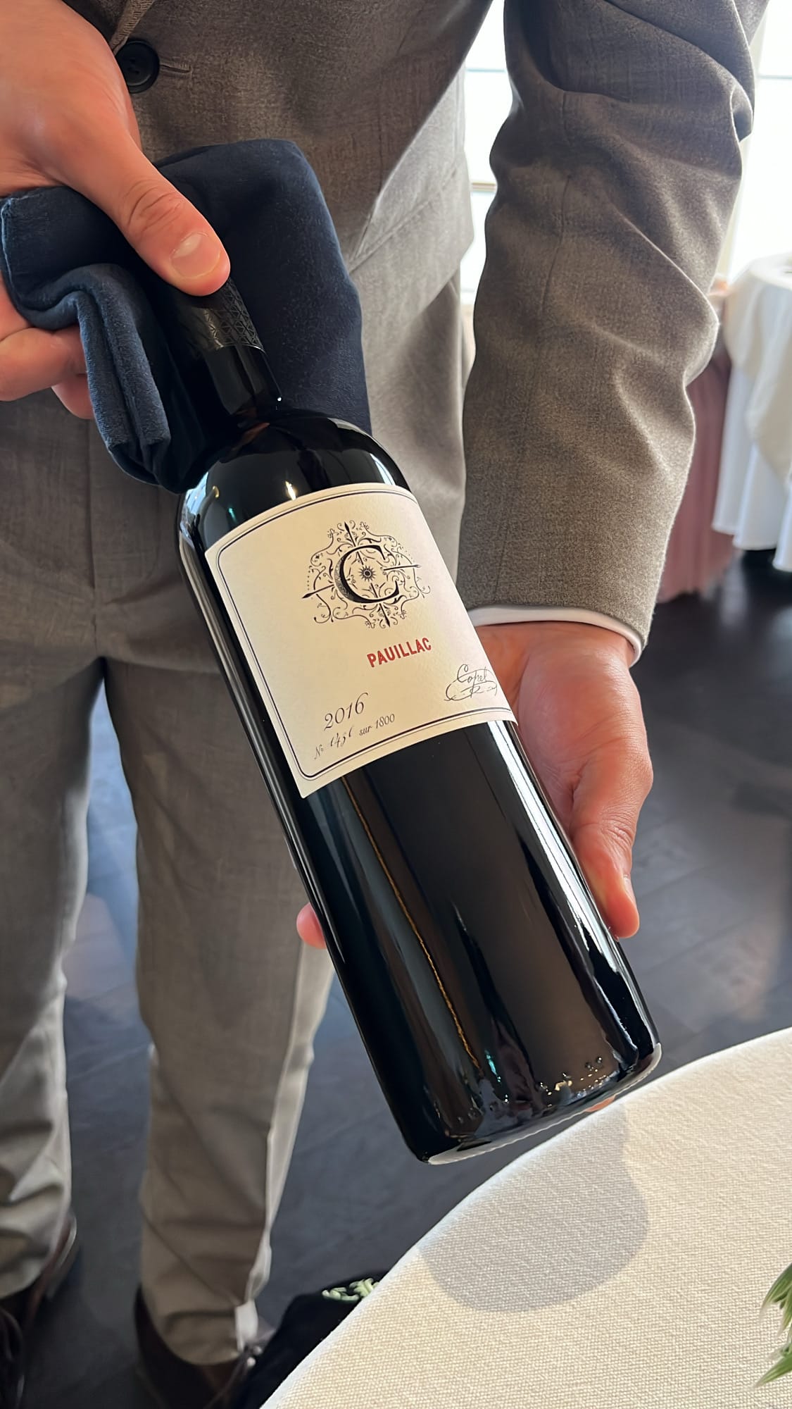Sommelier serving 2016 Pauillac Bordeaux red wine at Palate Busan
