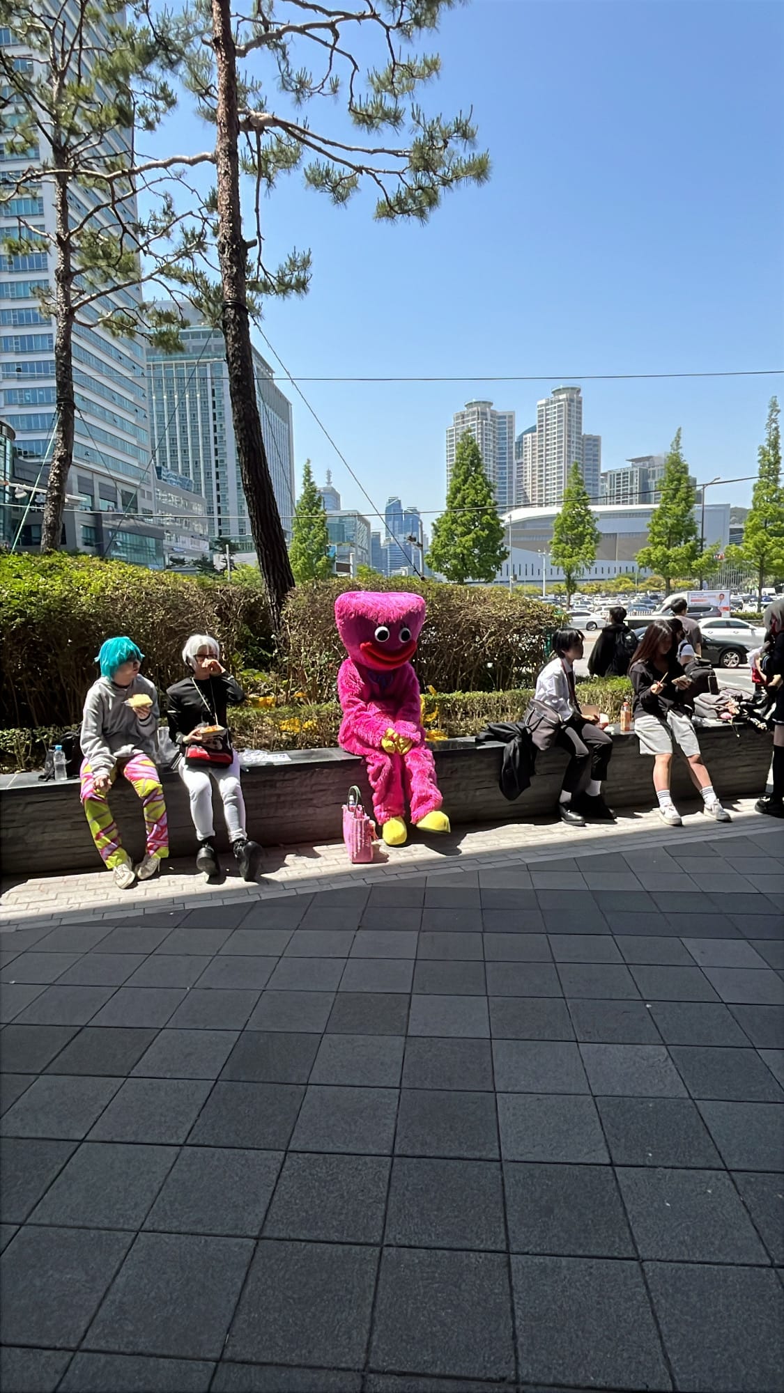 Cute Kissy Missy costume sitting with cosplayers at BEXCO