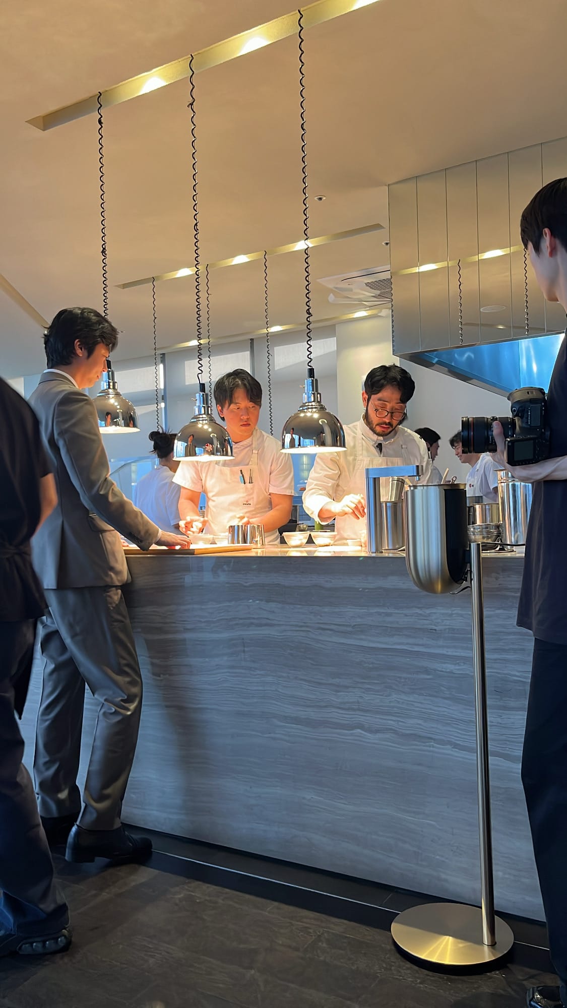 Relaxed dining service and kitchen tempo at Palate Busan